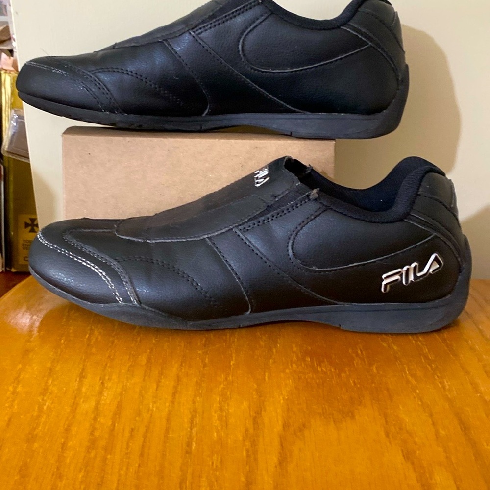 FILA slip on athletic shoe.